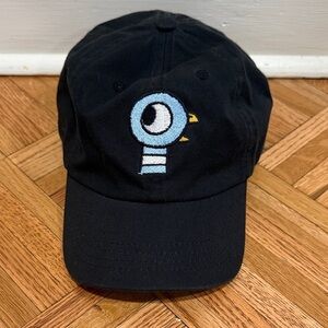 Mo Willem’s Pigeon Black Cap with Blue Bird Embroidery